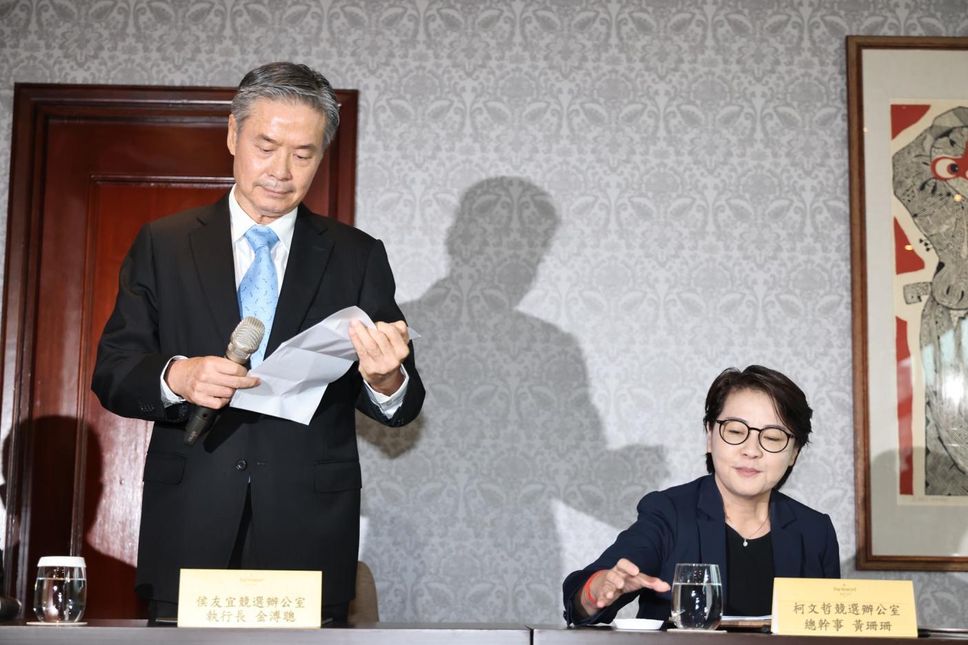 金溥聰與黃珊珊14日出席藍白合會前記者會。林啟弘攝