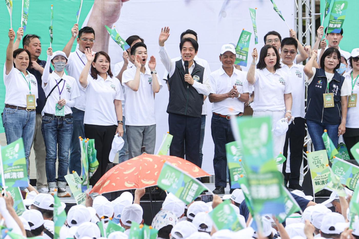 王世堅缺席挺賴造勢，引發堅偉心結未解揣測。中央社